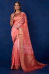 Buy beautiful light pink striped Kora Banarasi saree online in USA with zari border. Keep your ethnic wardrobe up to date with latest designer sarees, pure silk sarees, handwoven sarees, tussar silk sarees, embroidered sarees from Pure Elegance Indian saree store in USA.-full view