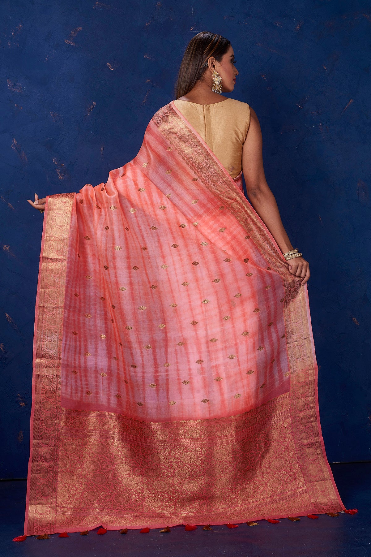 Buy beautiful light pink striped Kora Banarasi saree online in USA with zari border. Keep your ethnic wardrobe up to date with latest designer sarees, pure silk sarees, handwoven sarees, tussar silk sarees, embroidered sarees from Pure Elegance Indian saree store in USA.-back
