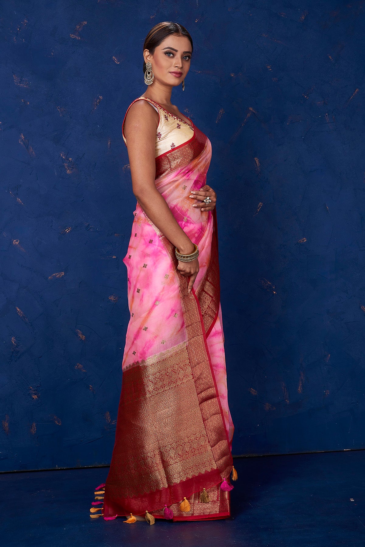Buy beautiful pink tie and dye Kora Banarasi saree online in USA with red zari border. Keep your ethnic wardrobe up to date with latest designer sarees, pure silk sarees, handwoven sarees, tussar silk sarees, embroidered sarees from Pure Elegance Indian saree store in USA.-side