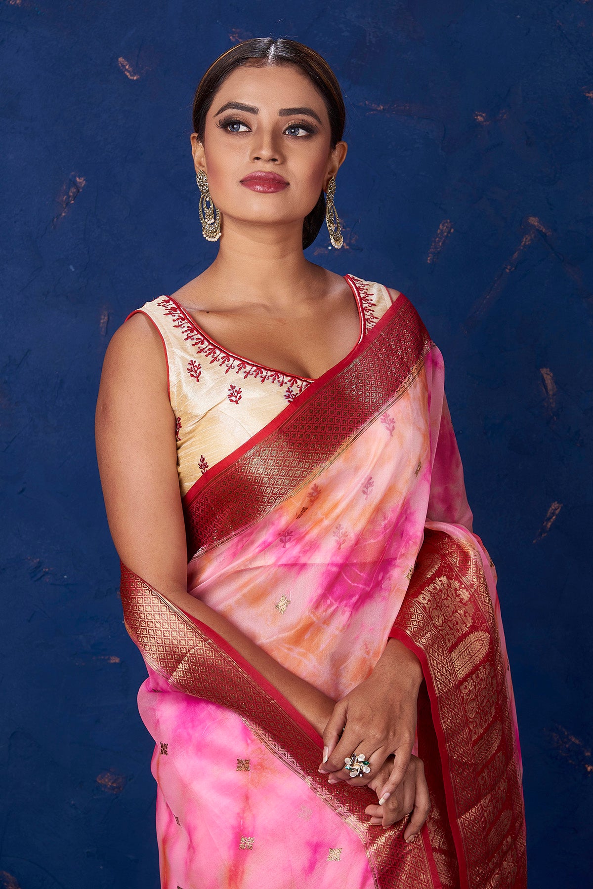 Buy beautiful pink tie and dye Kora Banarasi saree online in USA with red zari border. Keep your ethnic wardrobe up to date with latest designer sarees, pure silk sarees, handwoven sarees, tussar silk sarees, embroidered sarees from Pure Elegance Indian saree store in USA.-closeup
