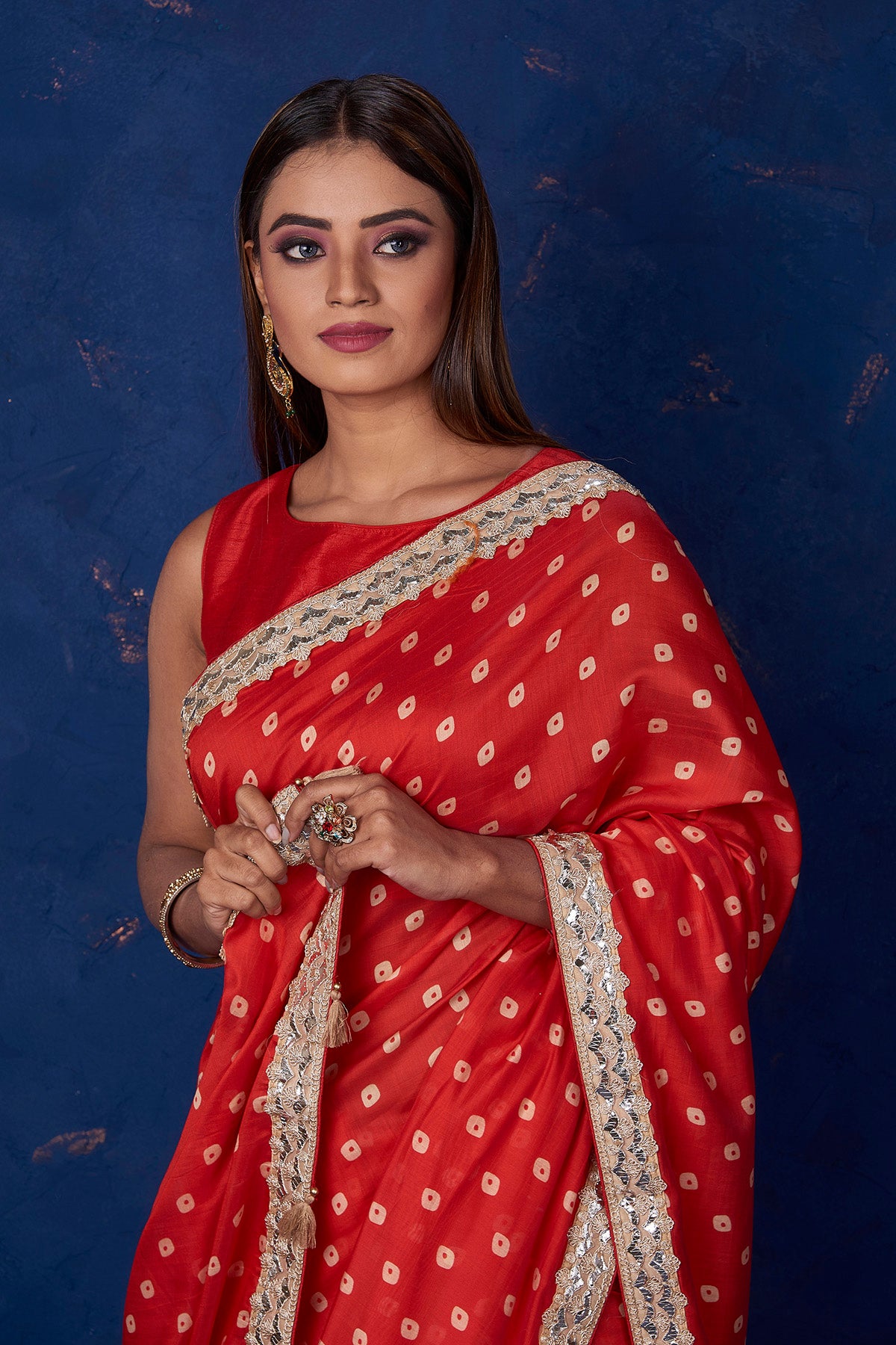 Shop beautiful red bandhej chanderi sari online in USA with embroidered border. Keep your ethnic wardrobe up to date with latest designer sarees, pure silk sarees, handwoven sarees, tussar silk sarees, embroidered sarees from Pure Elegance Indian saree store in USA.-closeup