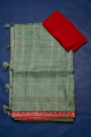 Buy stunning sage green self-check chanderi sari online in USA with embroidered border. Keep your ethnic wardrobe up to date with latest designer sarees, pure silk sarees, handwoven sarees, tussar silk sarees, embroidered sarees from Pure Elegance Indian saree store in USA.-blouse