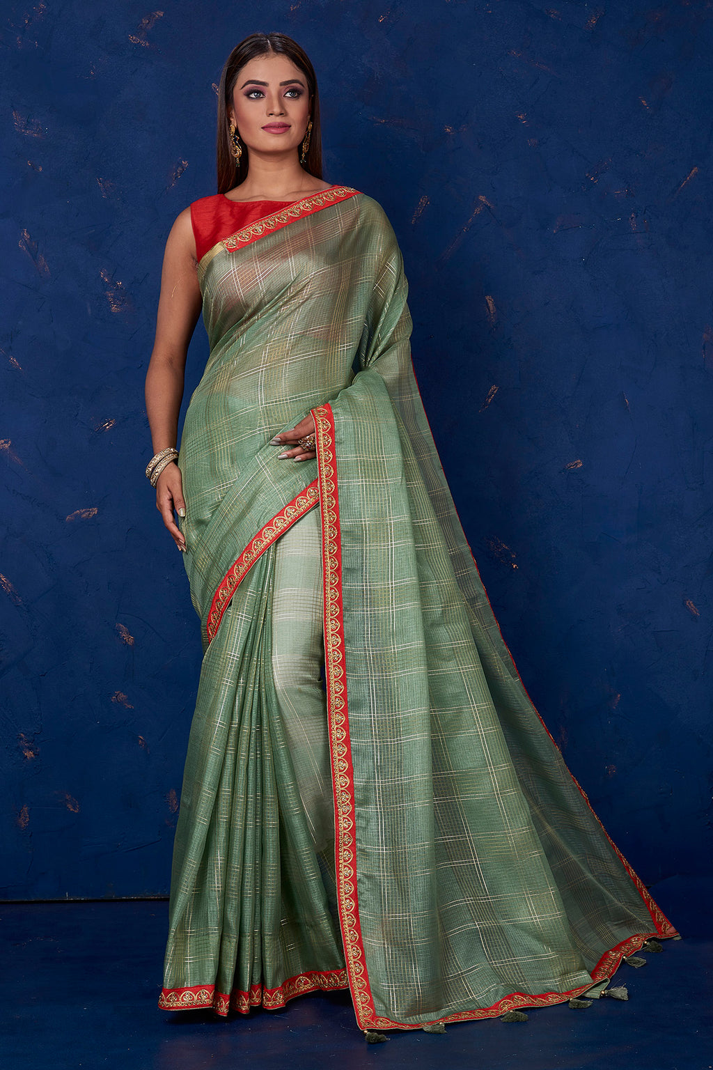 Buy stunning sage green self-check chanderi sari online in USA with embroidered border. Keep your ethnic wardrobe up to date with latest designer sarees, pure silk sarees, handwoven sarees, tussar silk sarees, embroidered sarees from Pure Elegance Indian saree store in USA.-full view
