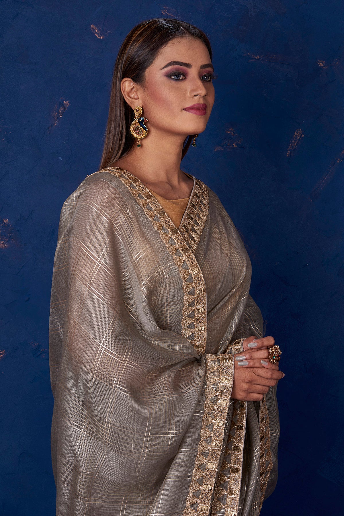 Shop stunning grey Kota check saree online in USA with embroidered border. Keep your ethnic wardrobe up to date with latest designer sarees, pure silk sarees, handwoven sarees, tussar silk sarees, embroidered sarees from Pure Elegance Indian saree store in USA.-closeup