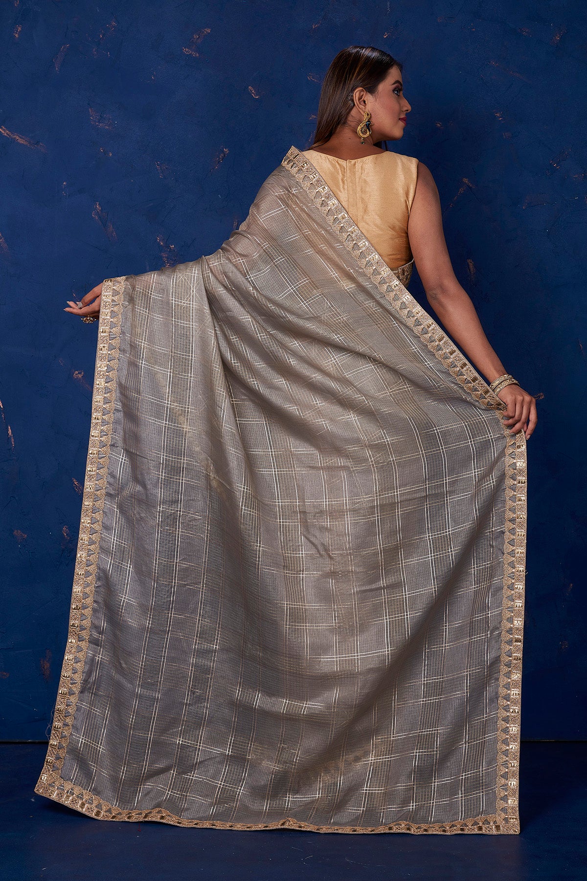 Shop stunning grey Kota check saree online in USA with embroidered border. Keep your ethnic wardrobe up to date with latest designer sarees, pure silk sarees, handwoven sarees, tussar silk sarees, embroidered sarees from Pure Elegance Indian saree store in USA.-back