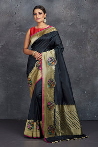 Shop stunning black Katan silk sari online in USA with golden zari border. Keep your ethnic wardrobe up to date with latest designer sarees, pure silk sarees, handwoven sarees, tussar silk sarees, embroidered sarees from Pure Elegance Indian saree store in USA.-full view