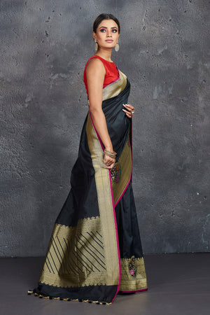 Shop stunning black Katan silk sari online in USA with golden zari border. Keep your ethnic wardrobe up to date with latest designer sarees, pure silk sarees, handwoven sarees, tussar silk sarees, embroidered sarees from Pure Elegance Indian saree store in USA.-side