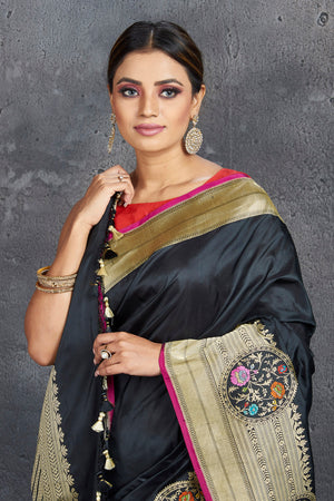 Shop stunning black Katan silk sari online in USA with golden zari border. Keep your ethnic wardrobe up to date with latest designer sarees, pure silk sarees, handwoven sarees, tussar silk sarees, embroidered sarees from Pure Elegance Indian saree store in USA.-closeup