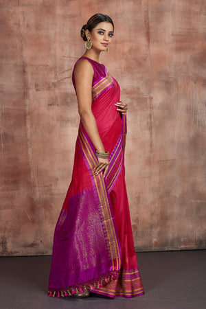 Shop beautiful mustard dupion silk saree online in USA with purple zari border. Be the center of attraction at parties and festive occasions in stunning silk sarees, handwoven sarees, embroidered sarees, designer sarees, Banarasi sarees, tussar silk saris from Pure Elegance Indian fashion store in USA.-side