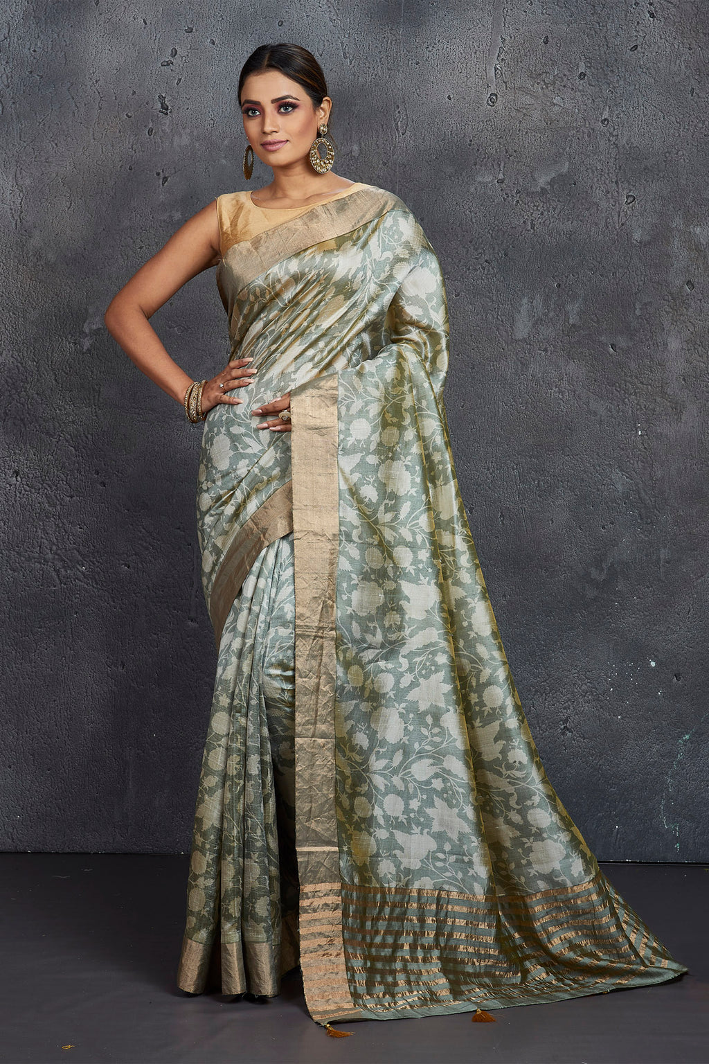 Shop elegant grey printed raw silk saree online in USA. Be the center of attraction at parties and festive occasions in stunning silk sarees, handwoven sarees, embroidered sarees, designer sarees, Banarasi sarees, tussar silk sarees from Pure Elegance Indian fashion store in USA.-full view