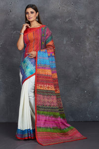Shop white and multicolor Kantha work saree online in USA. Keep your ethnic wardrobe up to date with latest designer sarees, pure silk sarees, handwoven sarees, tussar silk sarees, embroidered saris, Paithani sarees from Pure Elegance Indian saree store in USA.-pallu