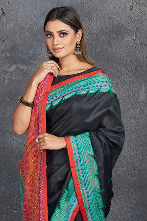 Buy stunning black silk saree online in USA with multicolor Kantha pallu and border. Keep your ethnic wardrobe up to date with latest designer sarees, pure silk sarees, handwoven sarees, tussar silk sarees, embroidered saris, Paithani sarees from Pure Elegance Indian saree store in USA.-closeup