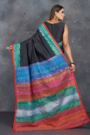 Buy stunning black silk saree online in USA with multicolor Kantha pallu and border. Keep your ethnic wardrobe up to date with latest designer sarees, pure silk sarees, handwoven sarees, tussar silk sarees, embroidered saris, Paithani sarees from Pure Elegance Indian saree store in USA.-back