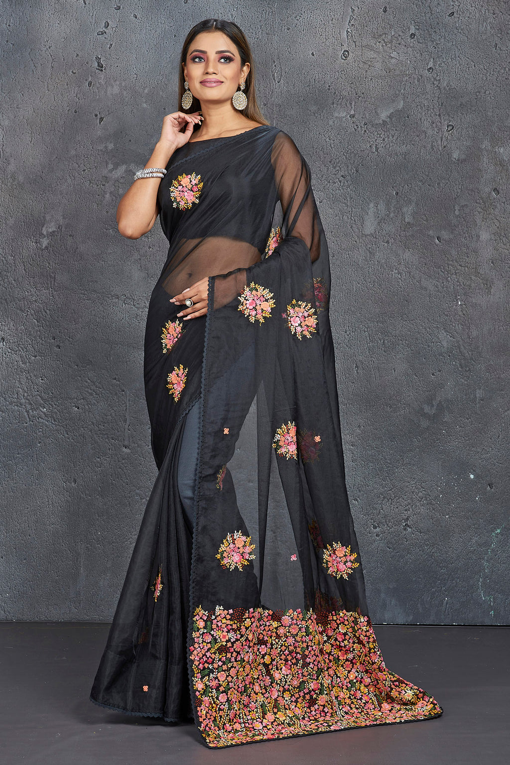 Buy stunning black organza saree online in USA with French knot embroidery. Keep your ethnic wardrobe up to date with latest designer sarees, pure silk sarees, handwoven sarees, tussar silk sarees, embroidered sarees, Paithani sarees from Pure Elegance Indian saree store in USA.-full view