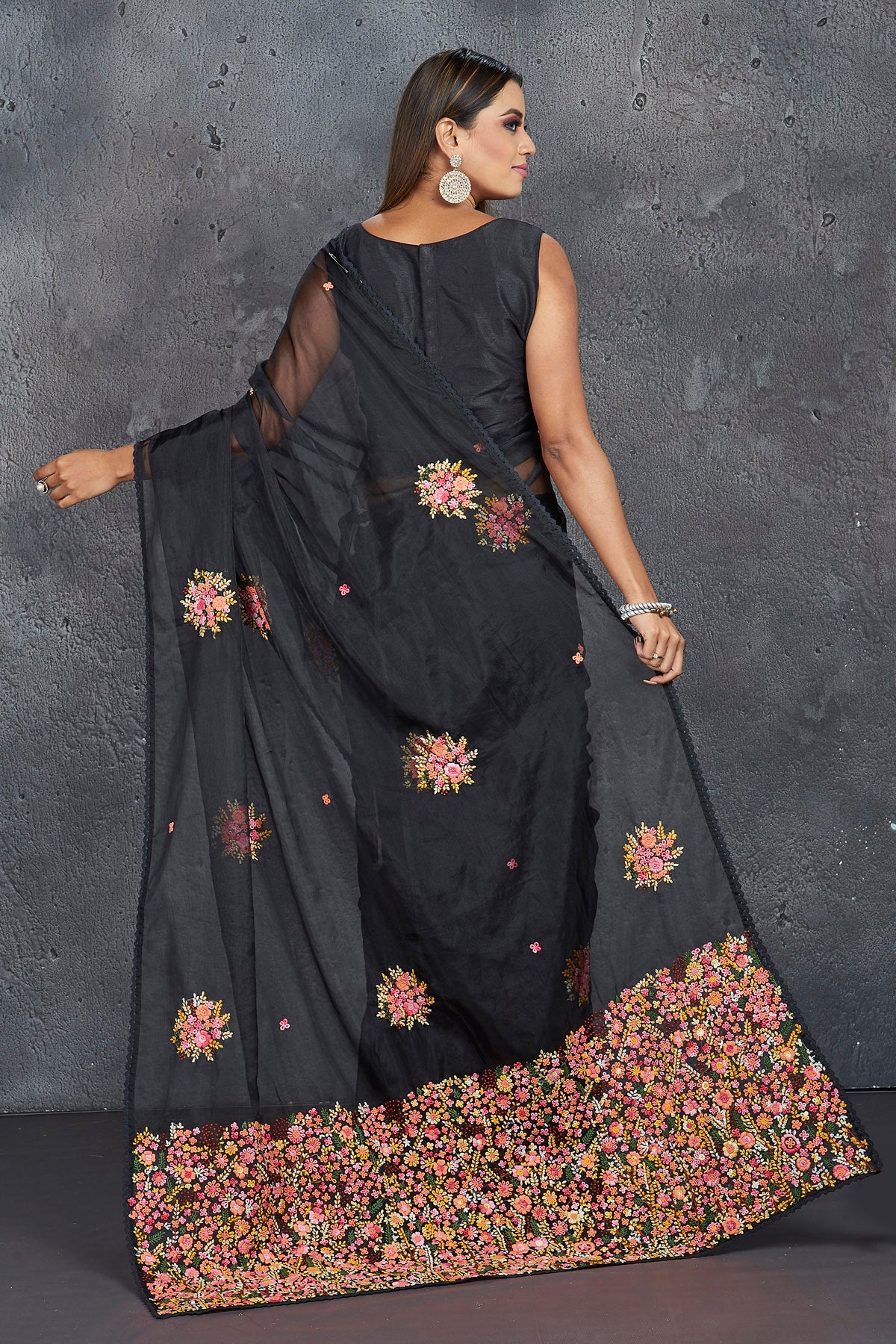 Buy stunning black organza saree online in USA with French knot embroidery. Keep your ethnic wardrobe up to date with latest designer sarees, pure silk sarees, handwoven sarees, tussar silk sarees, embroidered sarees, Paithani sarees from Pure Elegance Indian saree store in USA.-black