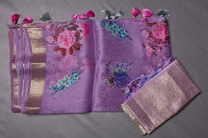 Buy beautiful lavender floral organza sari online in USA with zari border. Keep your ethnic wardrobe up to date with latest designer sarees, pure silk sarees, handwoven sarees, tussar silk sarees, embroidered sarees from Pure Elegance Indian saree store in USA.-blouse