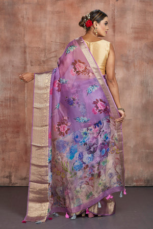 Buy beautiful lavender floral organza sari online in USA with zari border. Keep your ethnic wardrobe up to date with latest designer sarees, pure silk sarees, handwoven sarees, tussar silk sarees, embroidered sarees from Pure Elegance Indian saree store in USA.-back