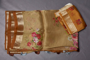 Buy gorgeous beige floral organza saree online in USA with zari border. Keep your ethnic wardrobe up to date with latest designer sarees, pure silk sarees, handwoven sarees, tussar silk sarees, embroidered sarees from Pure Elegance Indian saree store in USA.-back