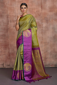 Shop stunning pista green Kanjivaram saree online in USA with purple border with buta. Keep your ethnic wardrobe up to date with latest designer sarees, pure silk sarees, handwoven sarees, tussar silk sarees, embroidered sarees from Pure Elegance Indian saree store in USA.-full view
