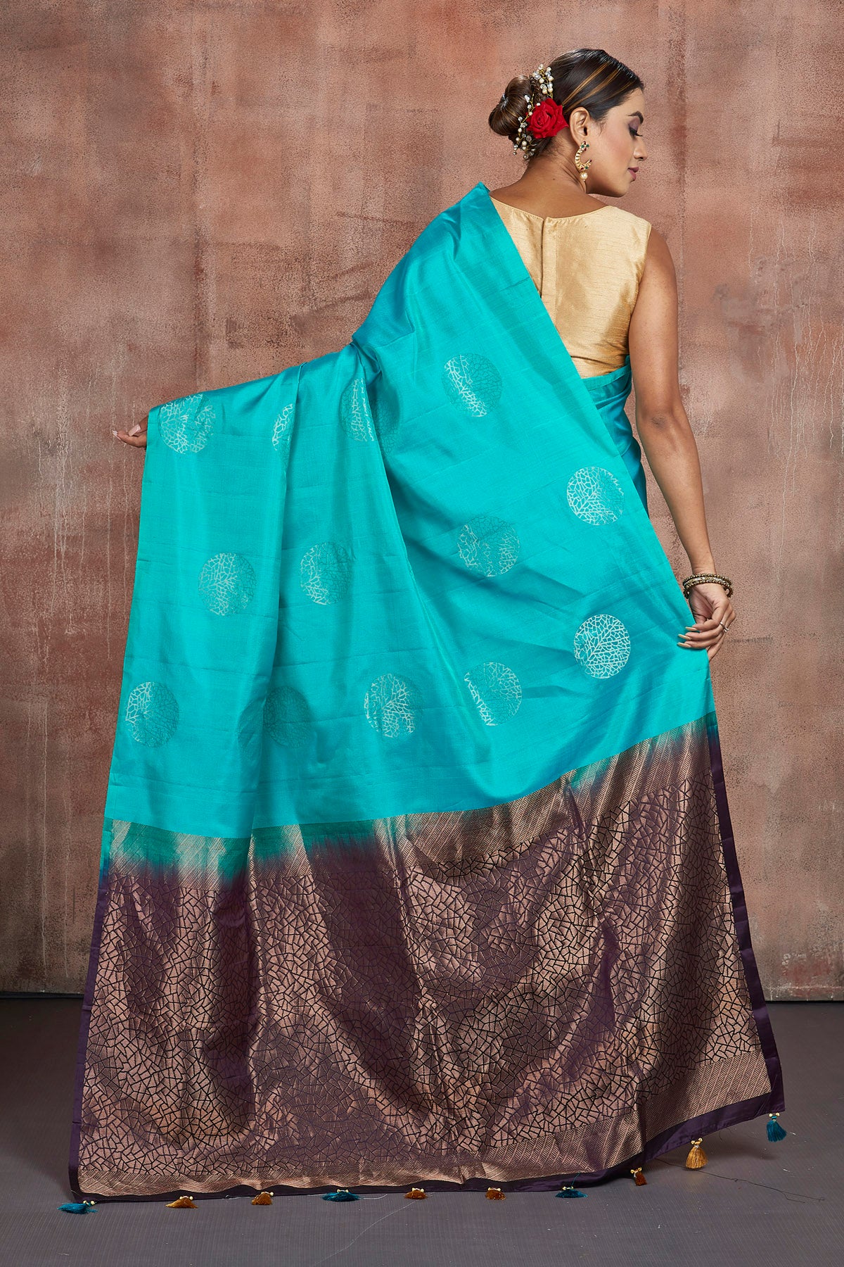 Shop beautiful turquoise blue Kanjivaram saree online in USA with purple zari pallu. Keep your ethnic wardrobe up to date with latest designer sarees, pure silk sarees, handwoven sarees, tussar silk sarees, embroidered sarees from Pure Elegance Indian saree store in USA.-back