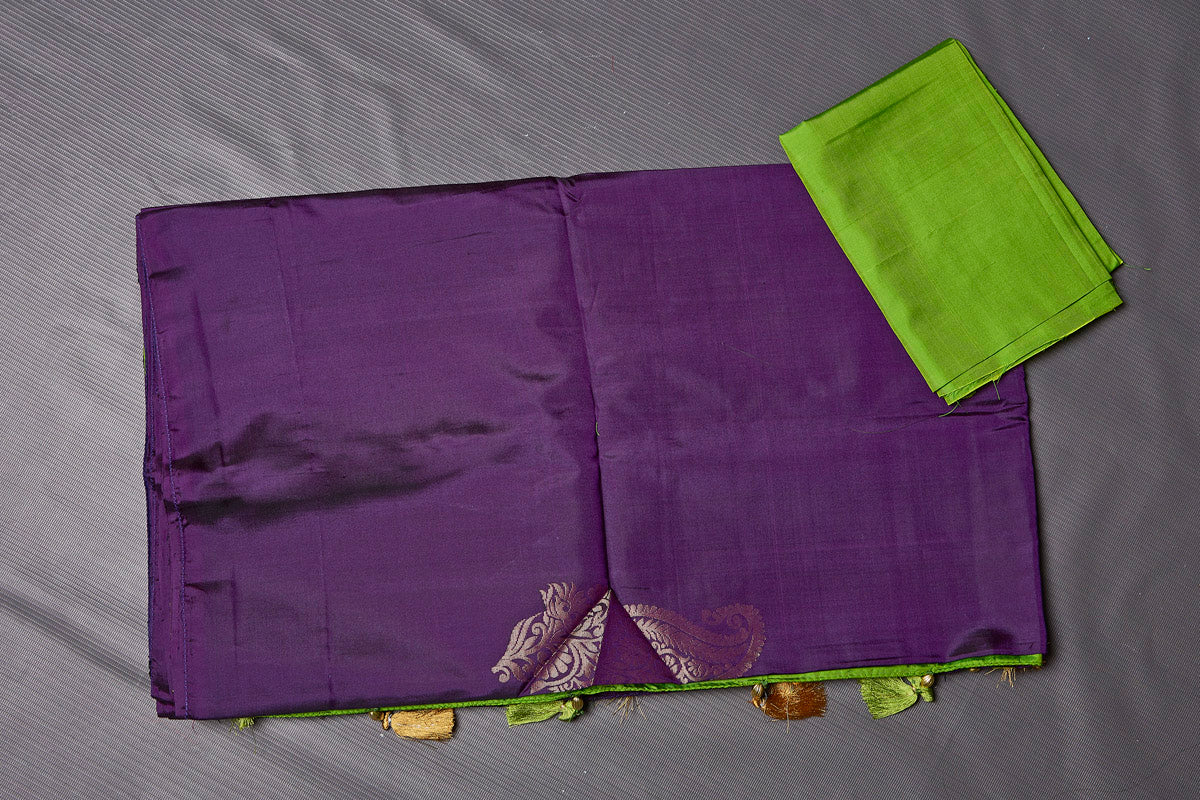 Shop beautiful purple Kanjivaram silk sari online in USA with green zari pallu. Keep your ethnic wardrobe up to date with latest designer sarees, pure silk sarees, handwoven sarees, tussar silk sarees, embroidered sarees from Pure Elegance Indian saree store in USA.-blouse