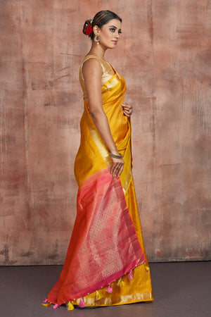 Shop beautiful mustard Kanjivaram silk sari online in USA with pink zari pallu. Keep your ethnic wardrobe up to date with latest designer sarees, pure silk sarees, handwoven sarees, tussar silk sarees, embroidered sarees from Pure Elegance Indian saree store in USA.-side