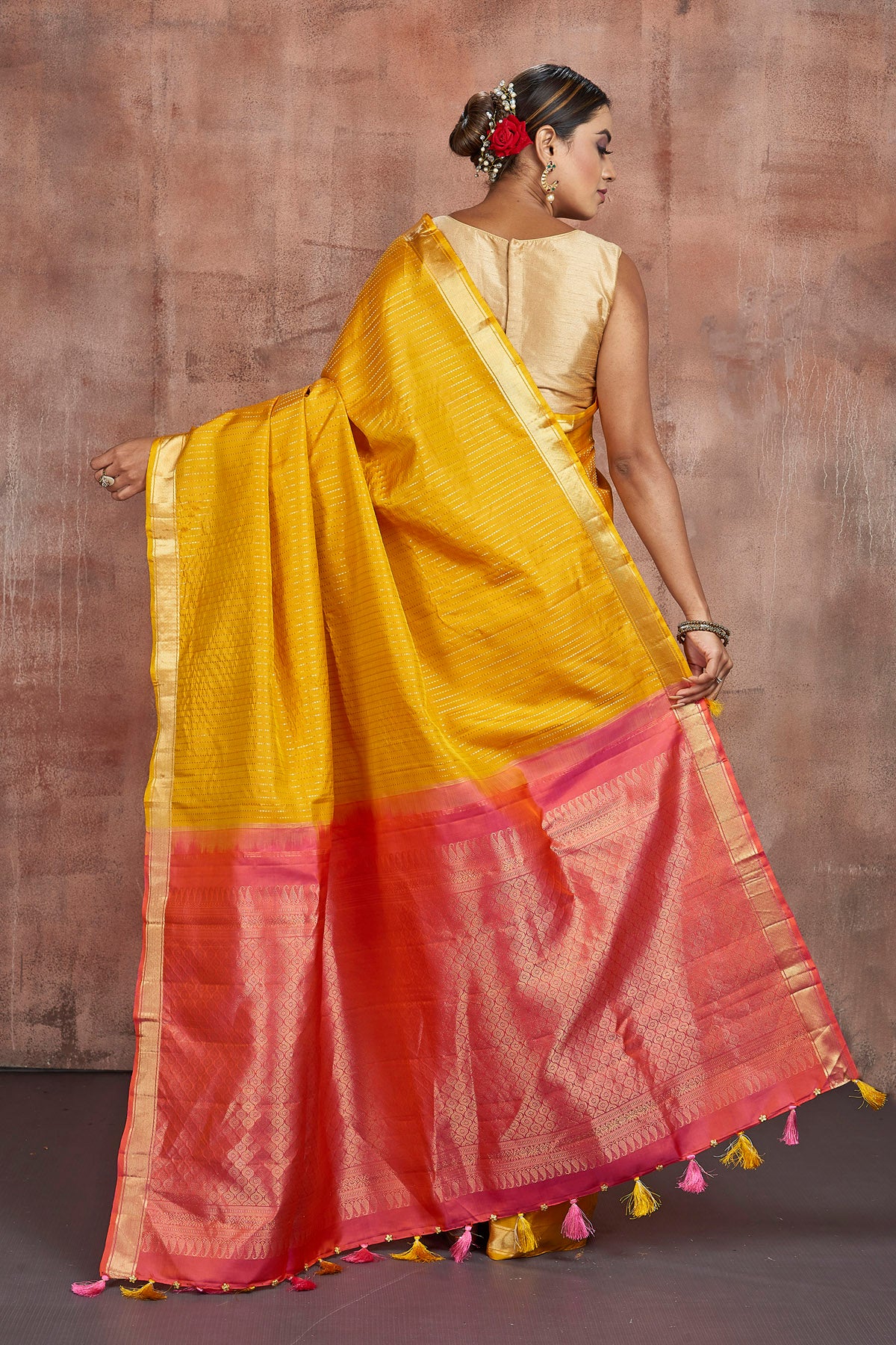 Shop beautiful mustard Kanjivaram silk sari online in USA with pink zari pallu. Keep your ethnic wardrobe up to date with latest designer sarees, pure silk sarees, handwoven sarees, tussar silk sarees, embroidered sarees from Pure Elegance Indian saree store in USA.-back