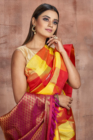 Shop yellow and red check Kanjeevaram saree online in USA with zari pallu. Keep your ethnic wardrobe up to date with latest designer sarees, pure silk sarees, handwoven sarees, tussar silk sarees, embroidered sarees from Pure Elegance Indian saree store in USA.-closeup