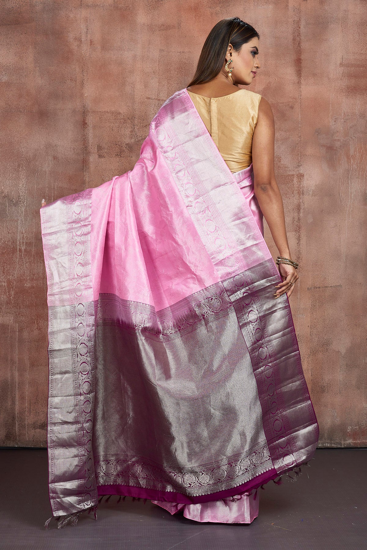 Buy stunning light pink Kanjeevaram sari online in USA with silver zari border. Keep your ethnic wardrobe up to date with latest designer sarees, pure silk sarees, handwoven sarees, tussar silk sarees, embroidered sarees from Pure Elegance Indian saree store in USA.-back