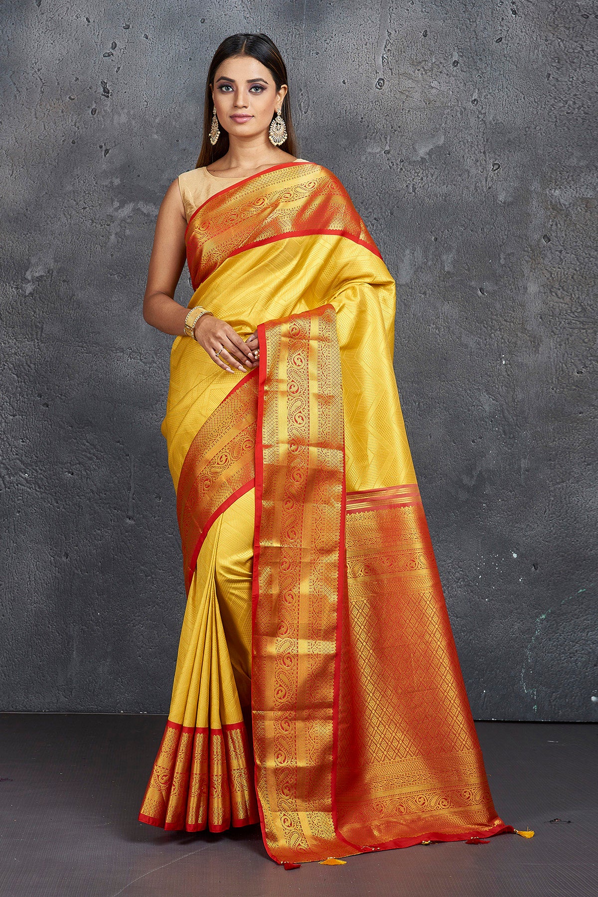 Karisma Kapoor radiates in a mustard yellow Kanchipuram saree for a shop  inauguration!