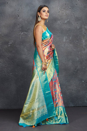 Buy stunning pink and blue Kanchipuram silk saree online in USA with meena zari work. Keep your ethnic wardrobe up to date with latest designer sarees, pure silk sarees, Kanchipuram silk sarees, handwoven sarees, tussar silk sarees, embroidered sarees from Pure Elegance Indian saree store in USA.-side
