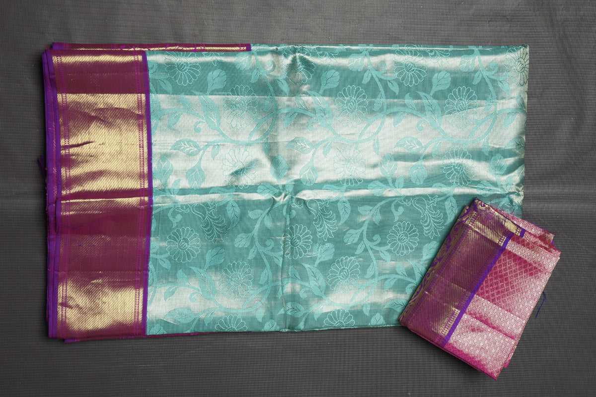 Buy stunning light blue Kanjeevaram sari online in USA with purple zari border. Keep your ethnic wardrobe up to date with latest designer sarees, pure silk sarees, handwoven sarees, tussar silk sarees, embroidered sarees, printed sarees from Pure Elegance Indian saree store in USA.-blouse