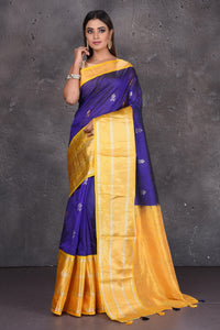 Shop stunning purple mangalgiri sari online in USA with yellow border and pallu. Keep your ethnic wardrobe up to date with latest designer sarees, pure silk sarees, handwoven sarees, tussar silk sarees, embroidered sarees, printed sarees from Pure Elegance Indian saree store in USA.-full view