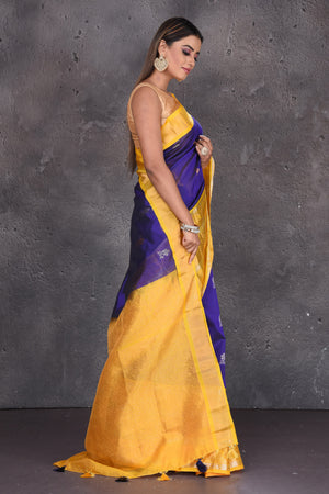 Shop stunning purple mangalgiri sari online in USA with yellow border and pallu. Keep your ethnic wardrobe up to date with latest designer sarees, pure silk sarees, handwoven sarees, tussar silk sarees, embroidered sarees, printed sarees from Pure Elegance Indian saree store in USA.-side