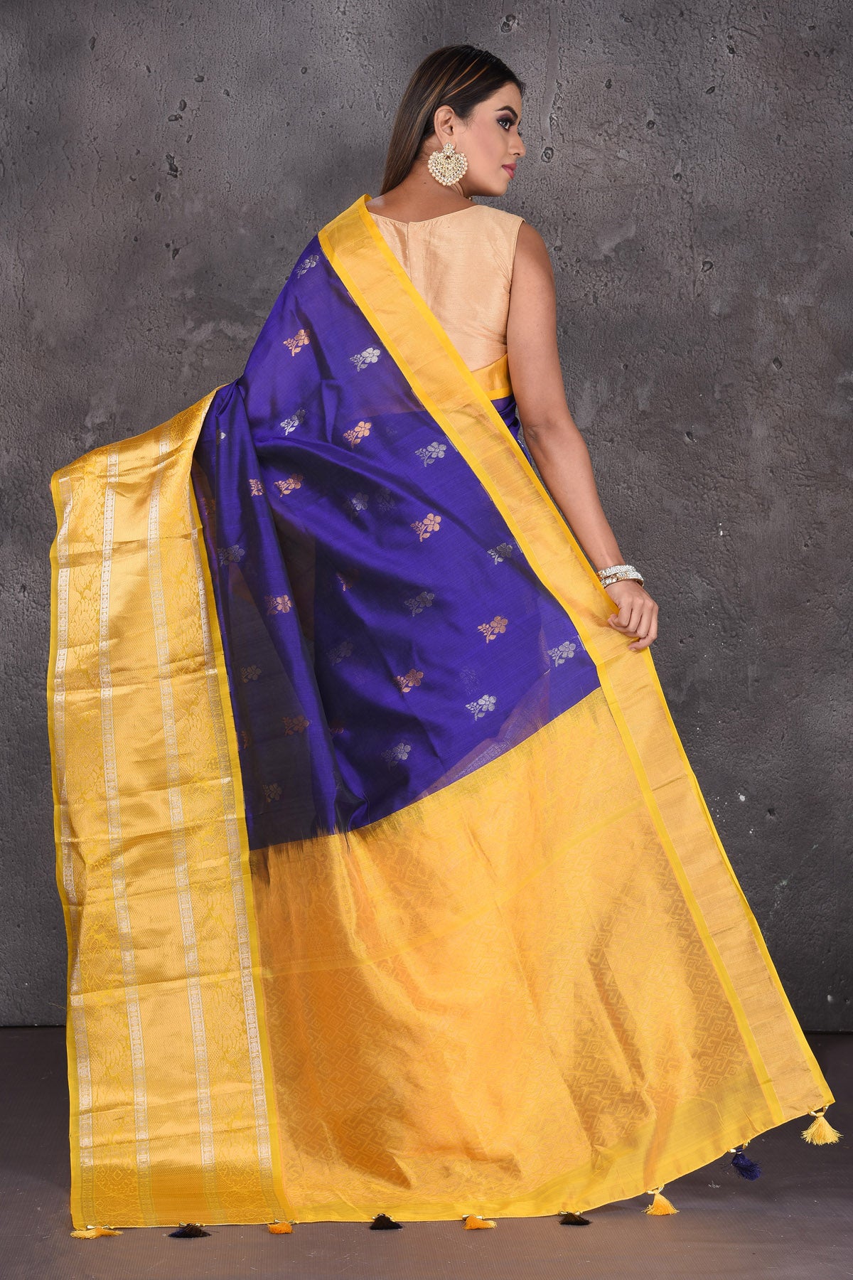 Shop stunning purple mangalgiri sari online in USA with yellow border and pallu. Keep your ethnic wardrobe up to date with latest designer sarees, pure silk sarees, handwoven sarees, tussar silk sarees, embroidered sarees, printed sarees from Pure Elegance Indian saree store in USA.-back