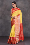 Shop beautiful yellow mangalgiri saree online in USA with red border and pallu. Keep your ethnic wardrobe up to date with latest designer sarees, pure silk sarees, handwoven sarees, tussar silk sarees, embroidered sarees, printed sarees from Pure Elegance Indian saree store in USA.-full view