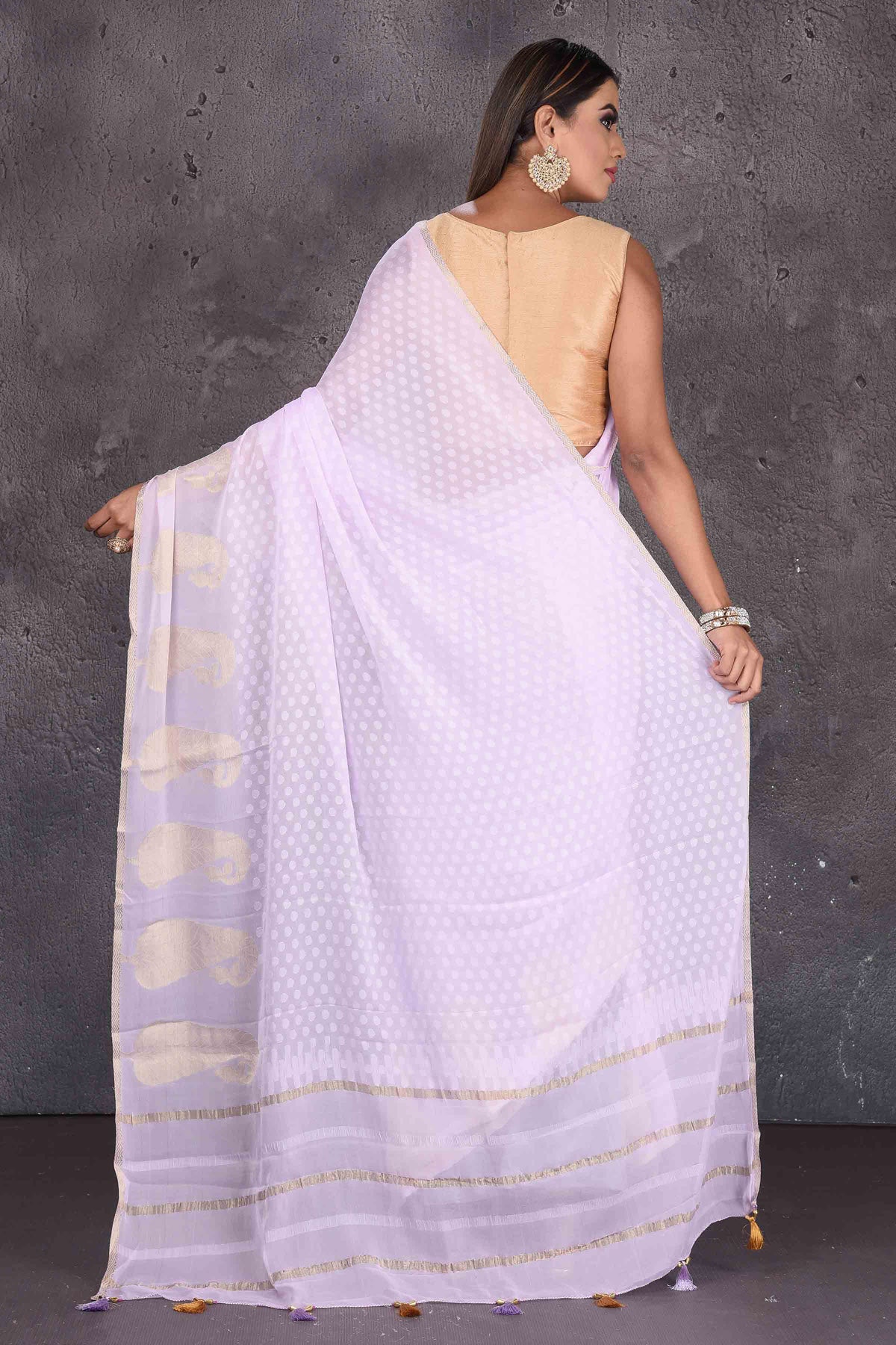 Shop stunning powder pink Mysore silk sari online in USA with paisley zari border. Keep your ethnic wardrobe up to date with latest designer sarees, pure silk sarees, handwoven sarees, tussar silk sarees, embroidered sarees, printed sarees from Pure Elegance Indian saree store in USA.-back