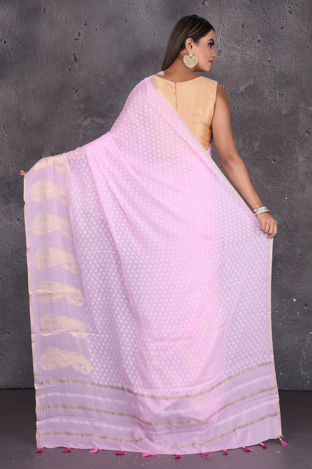 Buy beautiful light pink Mysore silk saree online in USA with paisley zari border. Keep your ethnic wardrobe up to date with latest designer sarees, pure silk sarees, handwoven sarees, tussar silk sarees, embroidered sarees, printed sarees from Pure Elegance Indian saree store in USA.-back