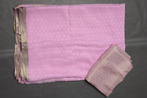 Buy beautiful light pink Mysore silk saree online in USA with paisley zari border. Keep your ethnic wardrobe up to date with latest designer sarees, pure silk sarees, handwoven sarees, tussar silk sarees, embroidered sarees, printed sarees from Pure Elegance Indian saree store in USA.-blouse