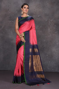 Buy beautiful pink Gadhwal handloom silk saree online in USA with blue zari pallu. Keep your ethnic wardrobe up to date with latest designer sarees, pure silk sarees, handwoven sarees, Kanchipuram silk sarees, embroidered sarees, georgette sarees from Pure Elegance Indian saree store in USA.-full view