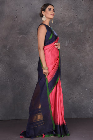 Buy beautiful pink Gadhwal handloom silk saree online in USA with blue zari pallu. Keep your ethnic wardrobe up to date with latest designer sarees, pure silk sarees, handwoven sarees, Kanchipuram silk sarees, embroidered sarees, georgette sarees from Pure Elegance Indian saree store in USA.-side