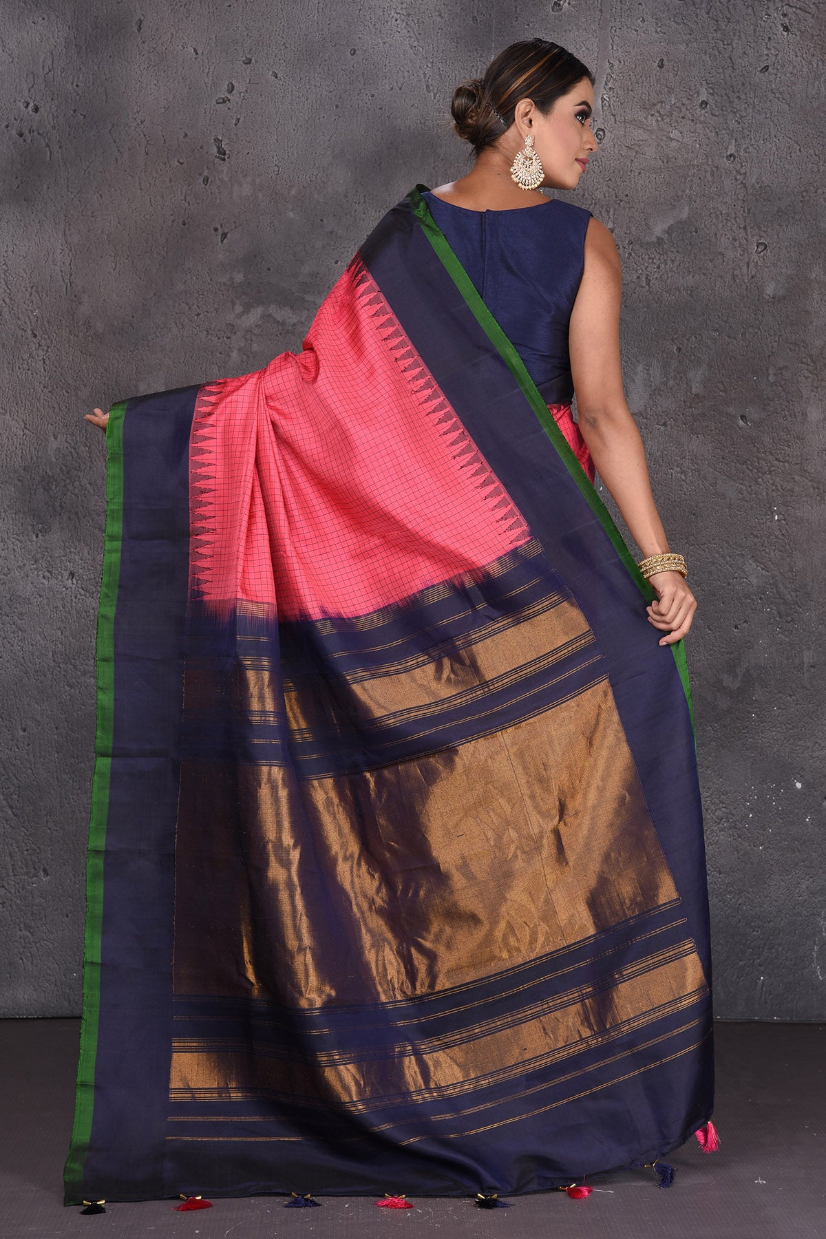 Buy beautiful pink Gadhwal handloom silk saree online in USA with blue zari pallu. Keep your ethnic wardrobe up to date with latest designer sarees, pure silk sarees, handwoven sarees, Kanchipuram silk sarees, embroidered sarees, georgette sarees from Pure Elegance Indian saree store in USA.-back