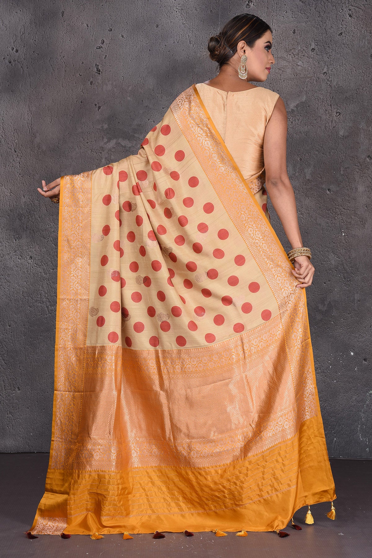 Buy beautiful beige polka dot tussar handloom saree online in USA with zari border. Keep your ethnic wardrobe up to date with latest designer sarees, pure silk sarees, handwoven sarees, Kanchipuram silk sarees, embroidered sarees, georgette sarees from Pure Elegance Indian saree store in USA.-back