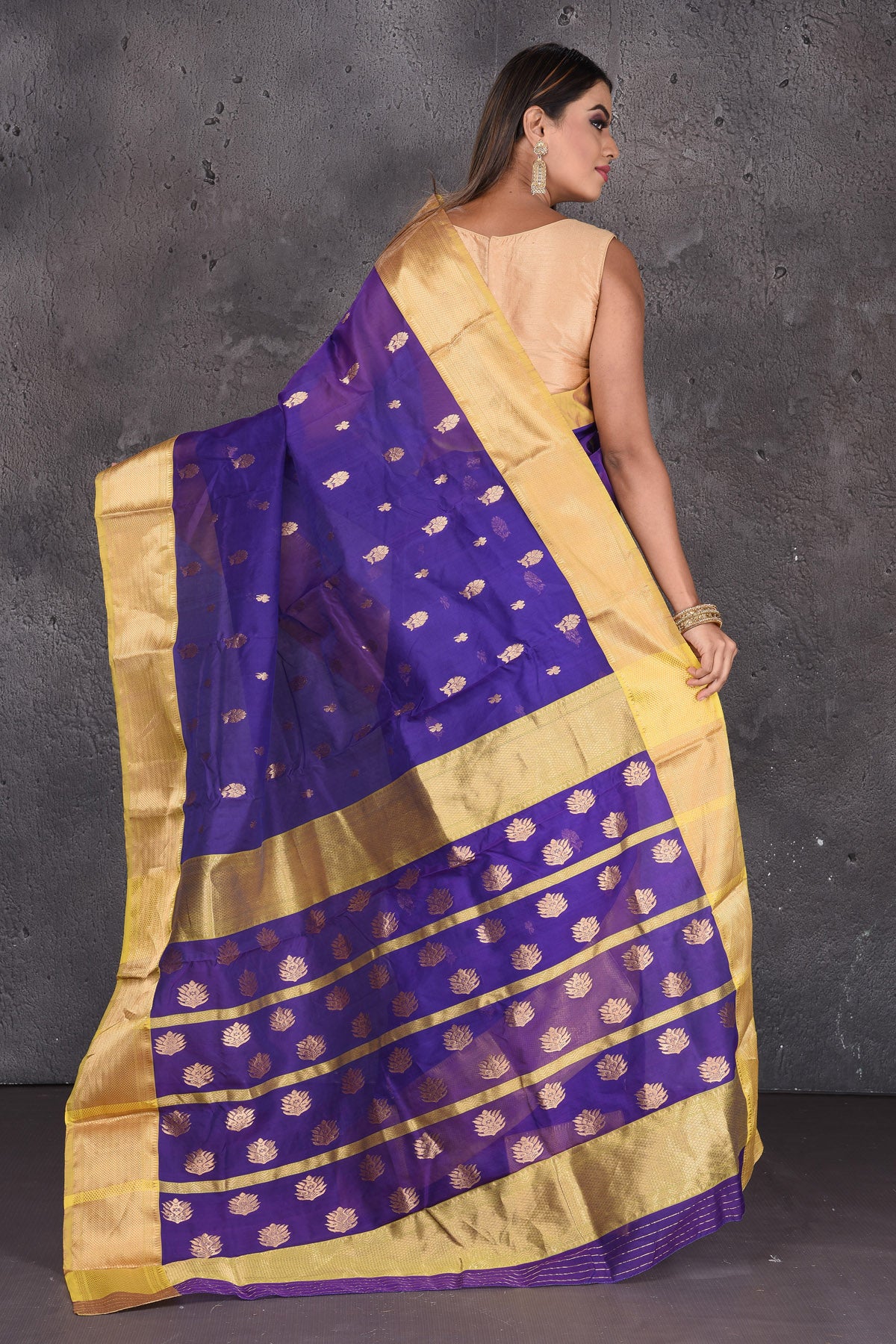Shop stunning purple Katan silk sari online in USA with golden zari border. Keep your ethnic wardrobe up to date with latest designer sarees, pure silk sarees, handwoven sarees, tussar silk sarees, embroidered saris from Pure Elegance Indian saree store in USA.-back