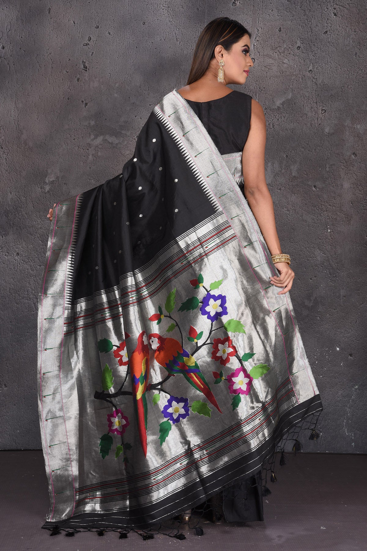 Shop black Paithani silk saree online in USA with single muniya zari border. Keep your ethnic wardrobe up to date with latest designer sarees, pure silk sarees, handwoven sarees, tussar silk sarees, embroidered saris, Paithani sarees from Pure Elegance Indian saree store in USA.-back