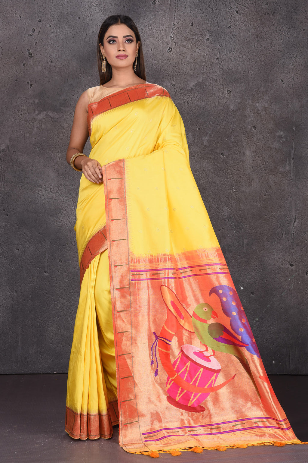 Shop beautifful yellow Paithani silk sari online in USA with single muniya zari border. Keep your ethnic wardrobe up to date with latest designer sarees, pure silk sarees, handwoven sarees, tussar silk sarees, embroidered saris, Paithani sarees from Pure Elegance Indian saree store in USA.-full view