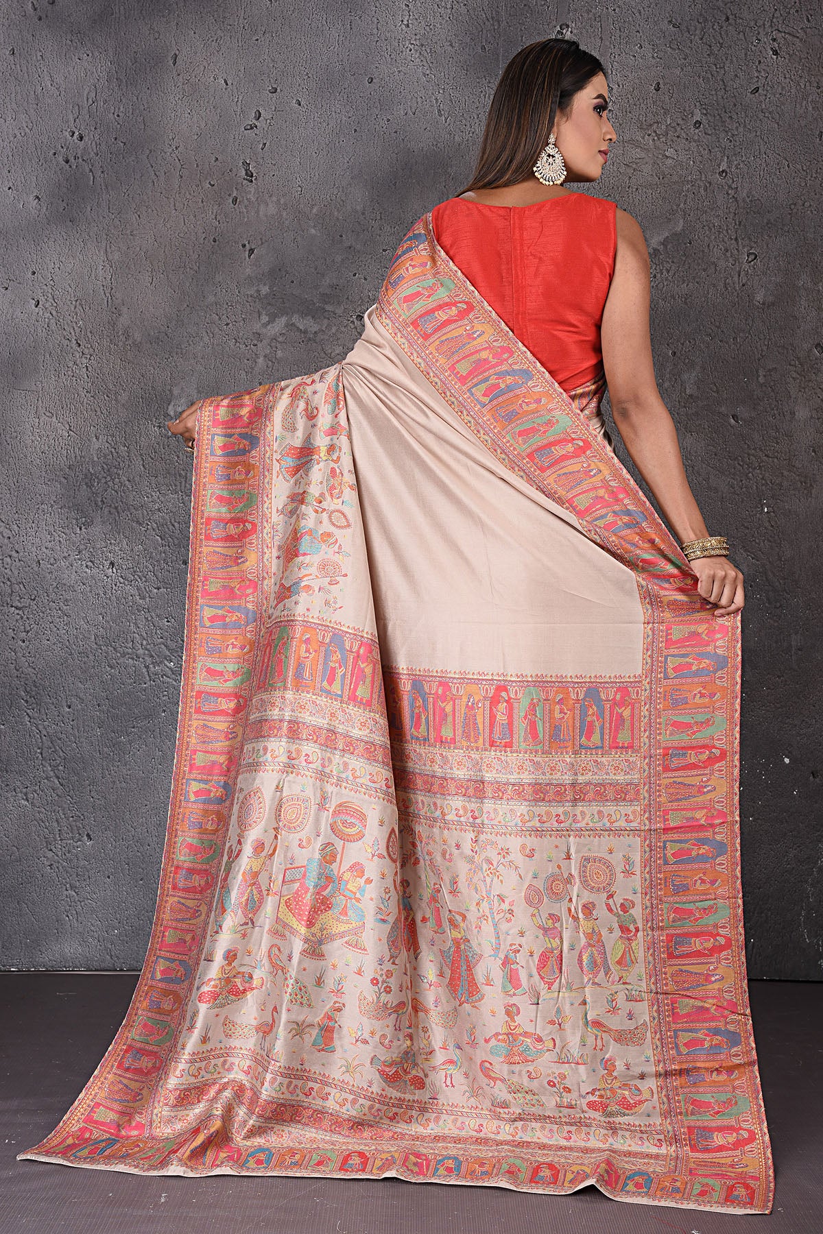 Buy gorgeous stunning beige Kani weave tussar silk sari online in USA. Keep your ethnic wardrobe up to date with latest designer sarees, pure silk sarees, handwoven sarees, tussar silk sarees, embroidered sarees from Pure Elegance Indian saree store in USA.-back
