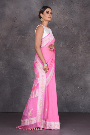 Buy beautiful neon pink Banarasi silk saree online in USA with silver zari border. Keep your ethnic wardrobe up to date with latest designer saris, pure silk sarees, handwoven silk sarees, tussar silk sarees, Benarasi sarees, embroidered sarees from Pure Elegance Indian saree store in USA.-side