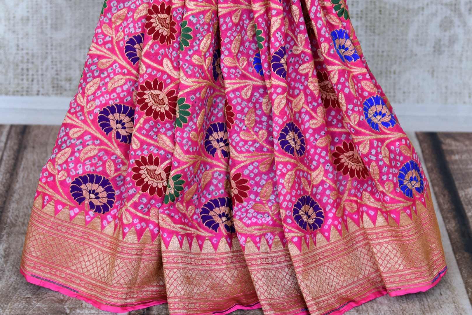 Shop beautiful pink georgette Bandhani saree online in USA with zari border. Add an elegant touch to your style with bandhej sarees, georgette saris, embroidered sarees, printed sarees, desinger sarees in USA from Pure Elegance Indian fashion store in USA.-pleags