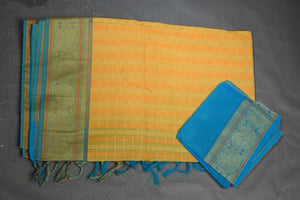 Buy beautiful yellow Kanchipuram cotton saree online in USA with blue zari border. Flaunt your ethnic style on special occasions with latest designer sarees, pure silk sarees, handwoven sarees, Kanchipuram silk sarees, embroidered sarees, georgette sarees from Pure Elegance Indian saree store in USA.-blouse